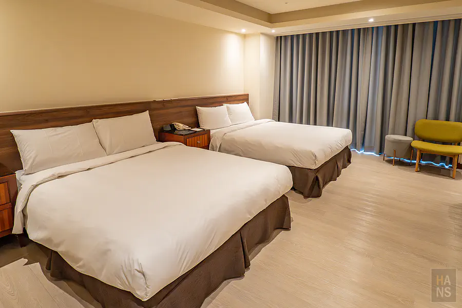 娜路彎精緻闔家房的床鋪區