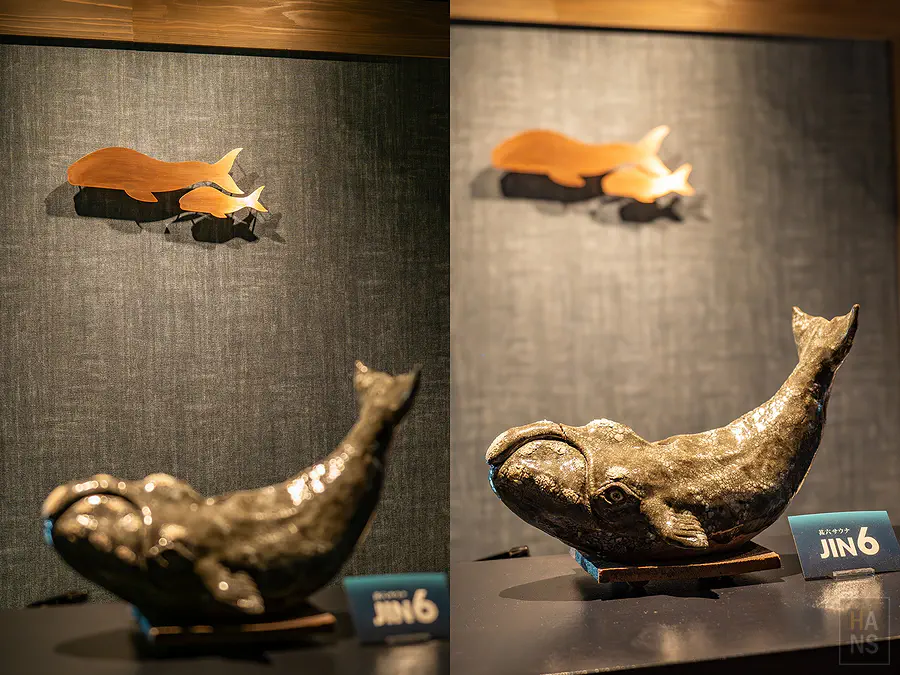 大廳牆面上充滿巧思的鯨魚母子金屬藝術裝飾與溫暖的燈光投射效果